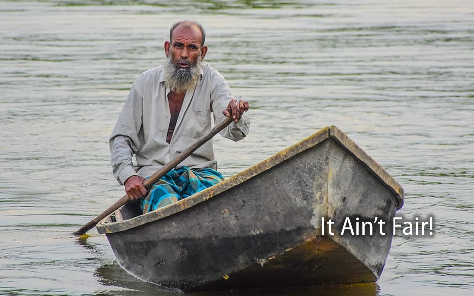 Old man alone in a boat